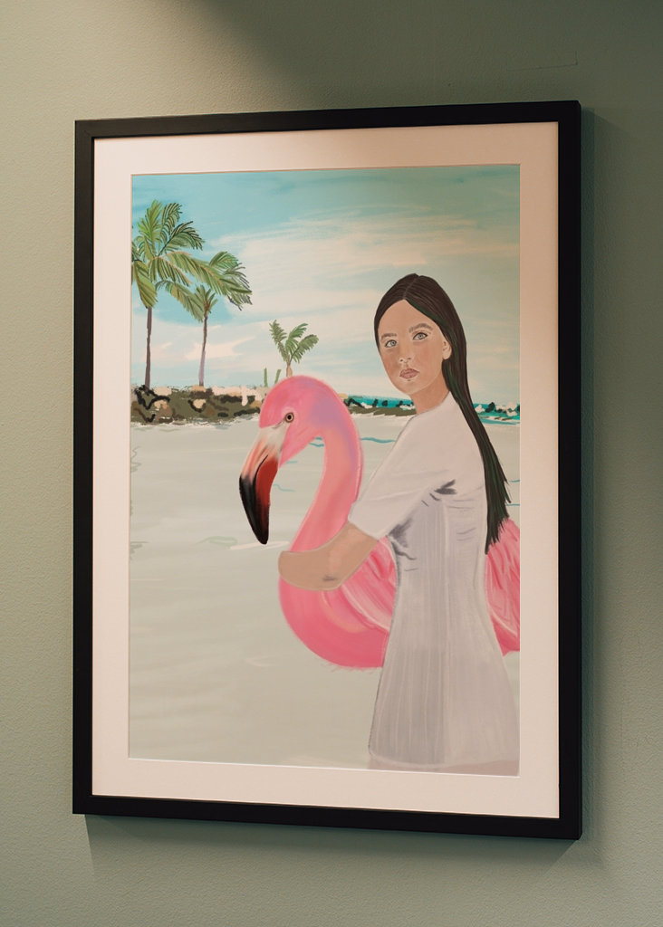 Flamingo und Mädchen am Strand von Aruba