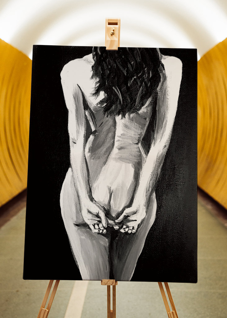 Mujer de pie desnuda hacia atrás 