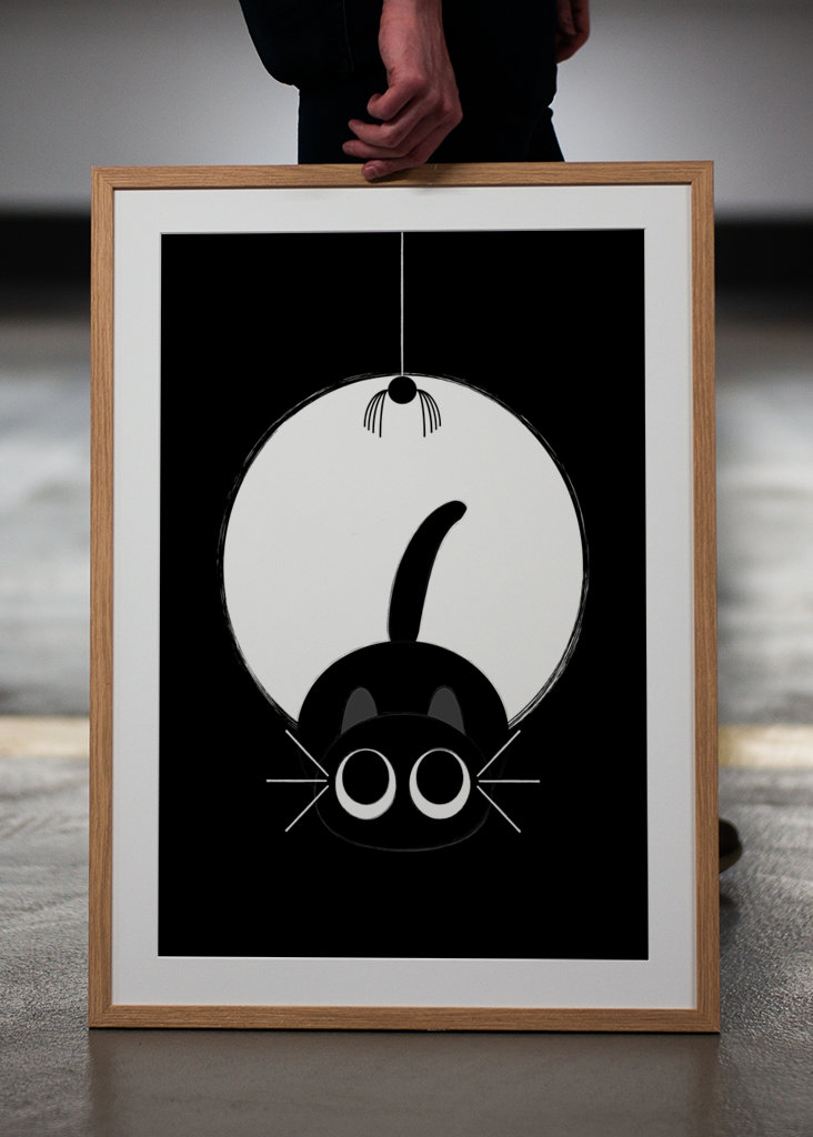 Kattens leg med edderkoppen