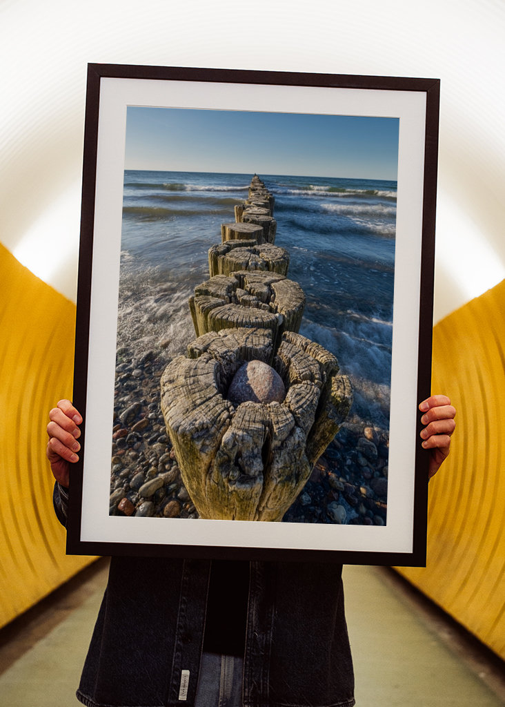 Groyne with waves in the sea