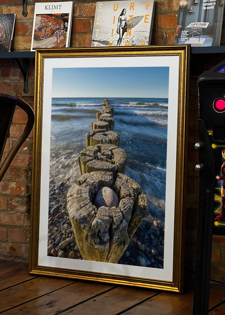 Groyne with waves in the sea