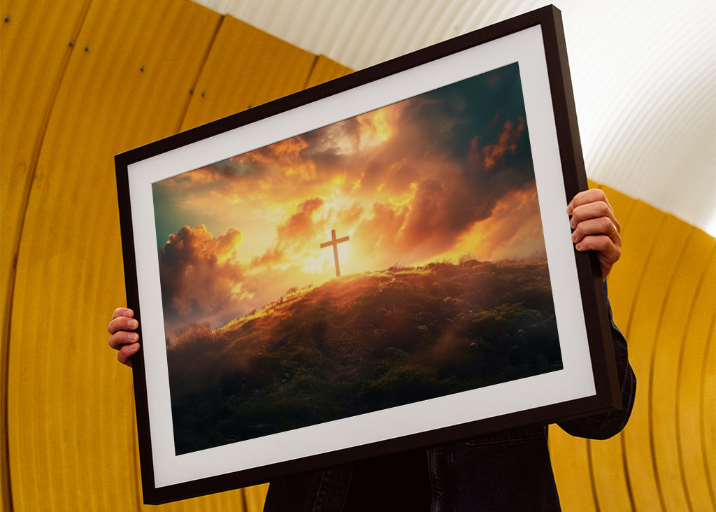 cross of Jesus in a sunset