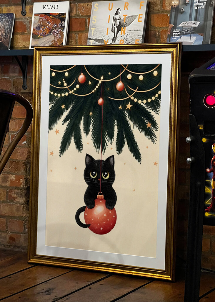 Cat under christmas tree