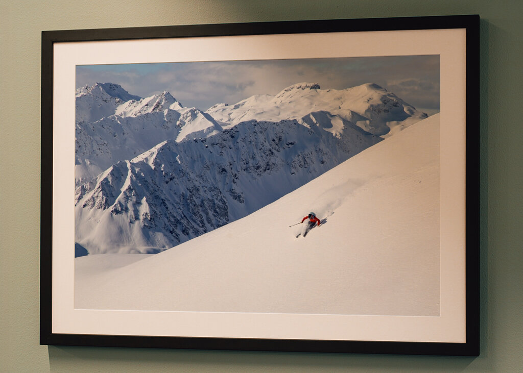 Skier with a view in the Alps
