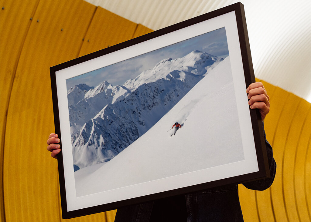 Skier with a view in the Alps