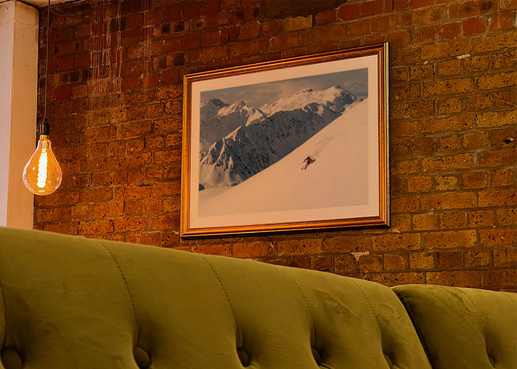 Skier with a view in the Alps
