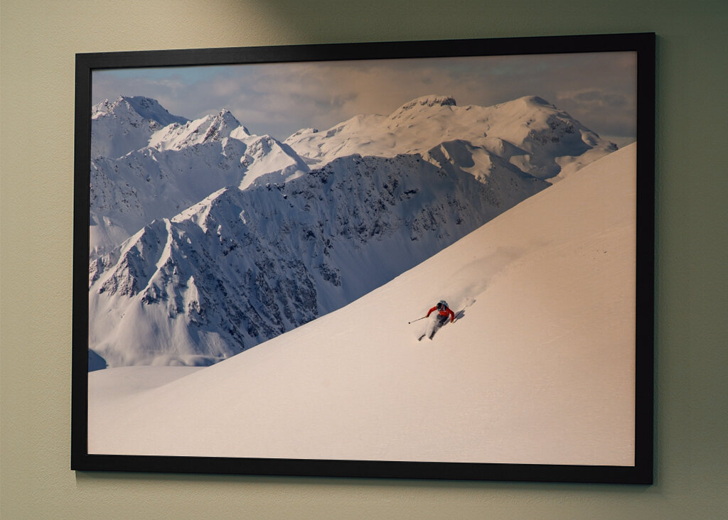 Skier with a view in the Alps