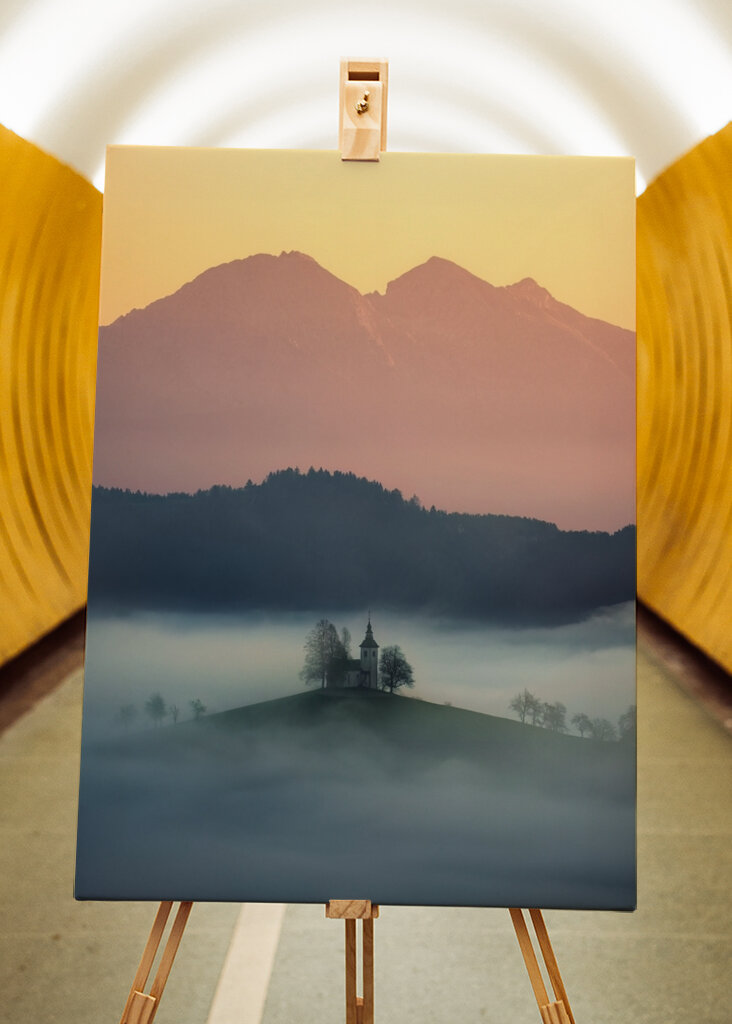 Slovenian church above the fog