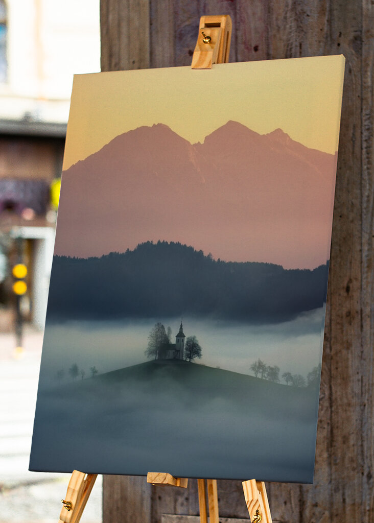 Slovenian church above the fog