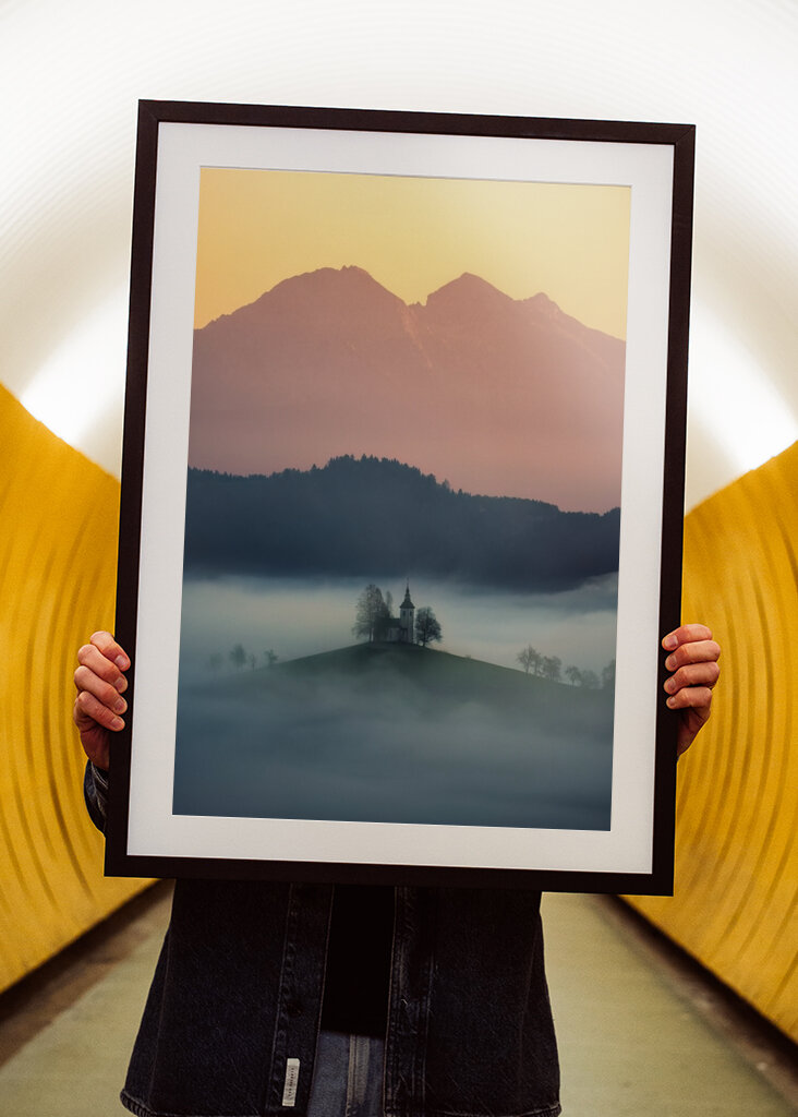 Slovenian church above the fog