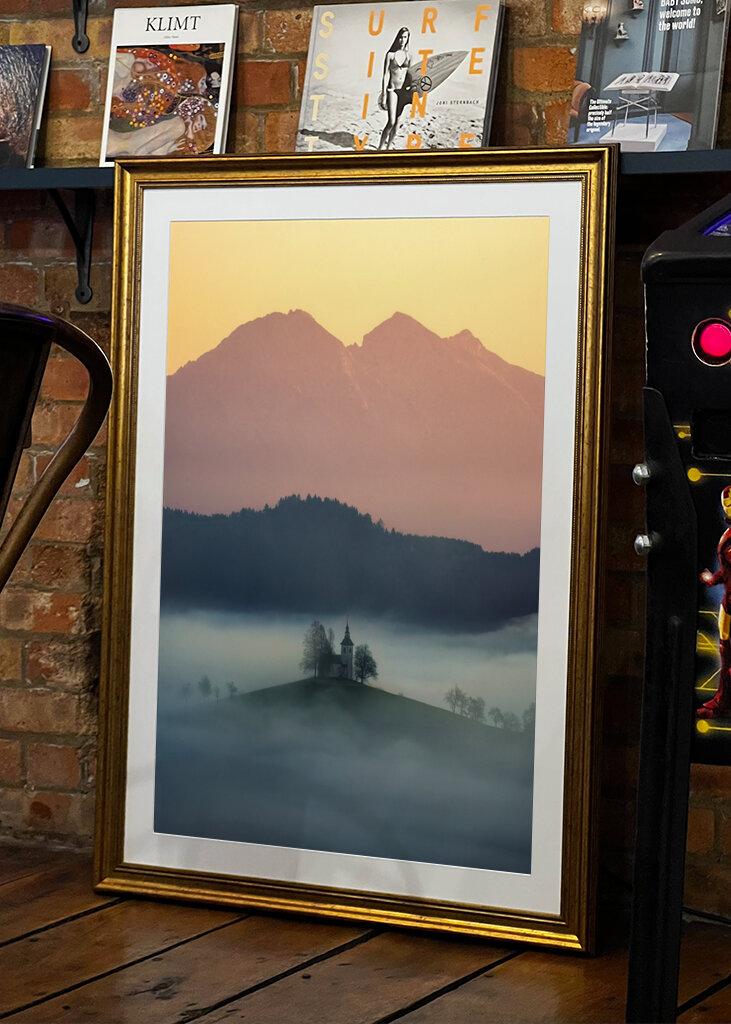Slovenian church above the fog