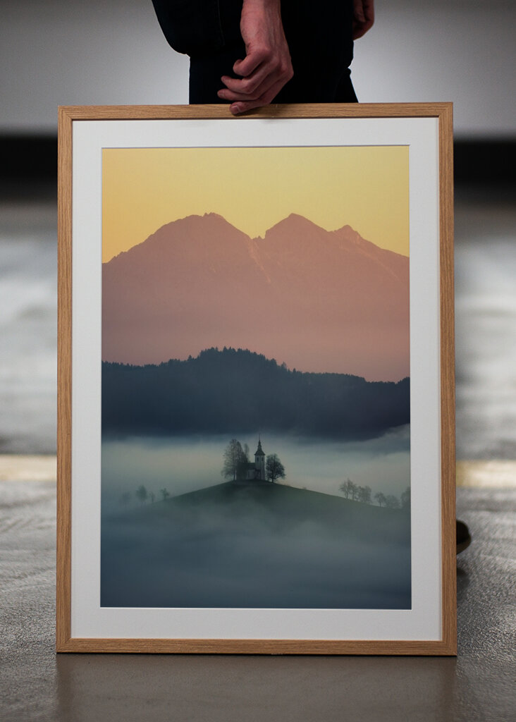Slovenian church above the fog