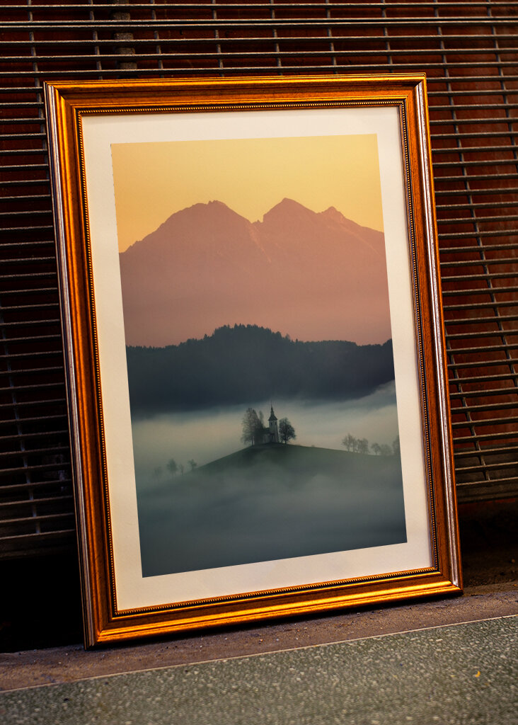 Slovenian church above the fog