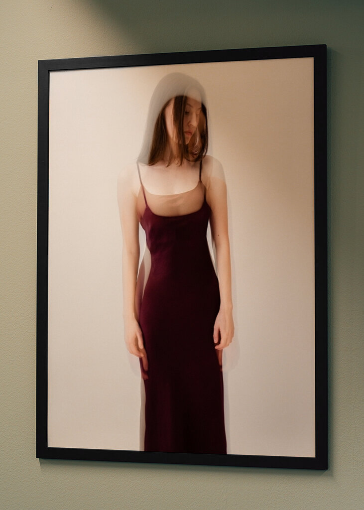 Woman in burgundy dress