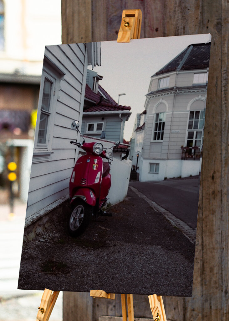 Red Vespa in a Nostalgic Stree