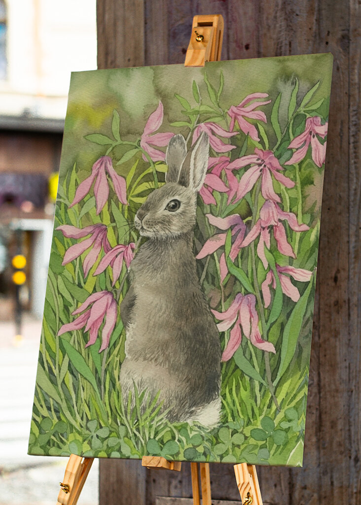 Rabbit among flowers and clove