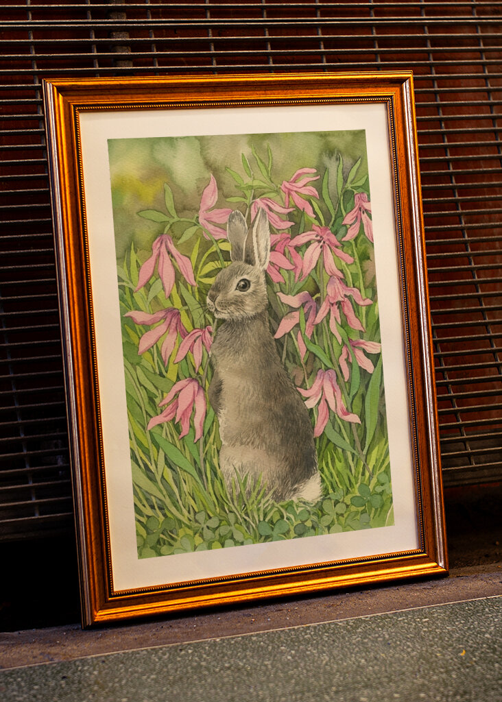 Rabbit among flowers and clove