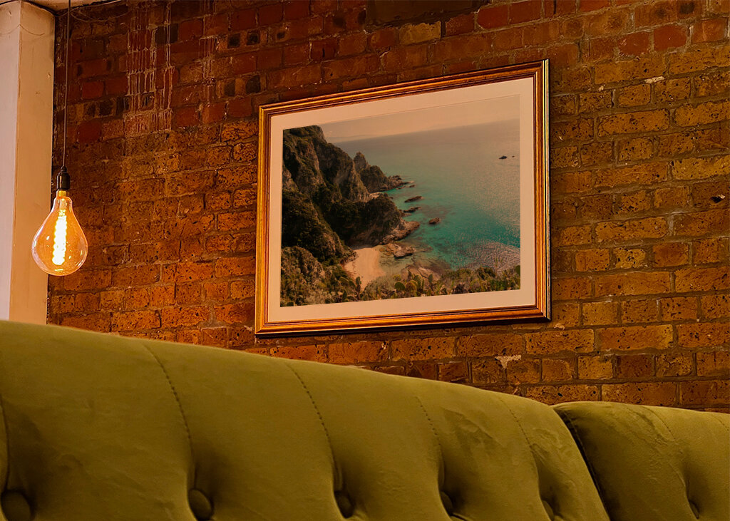 Rocks meet the turquoise sea