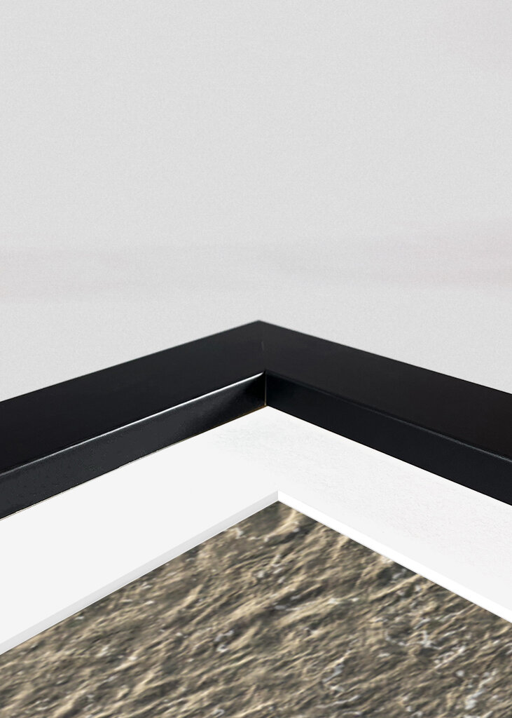 Surfer walking over the reef