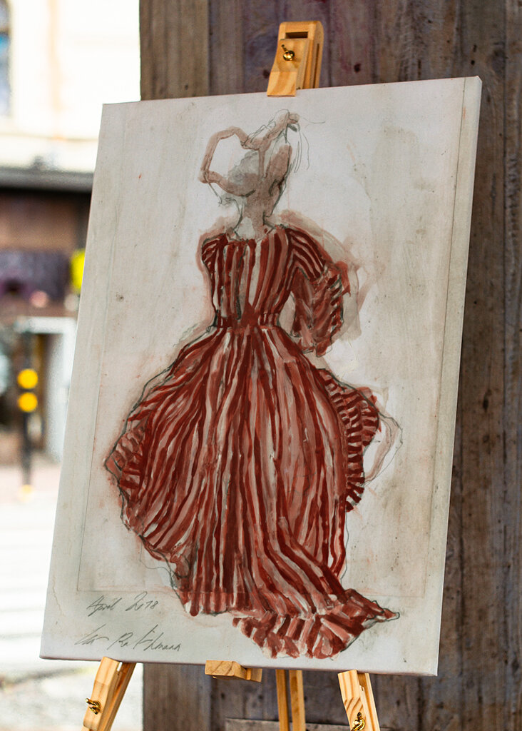 Woman In A Red Striped Dress