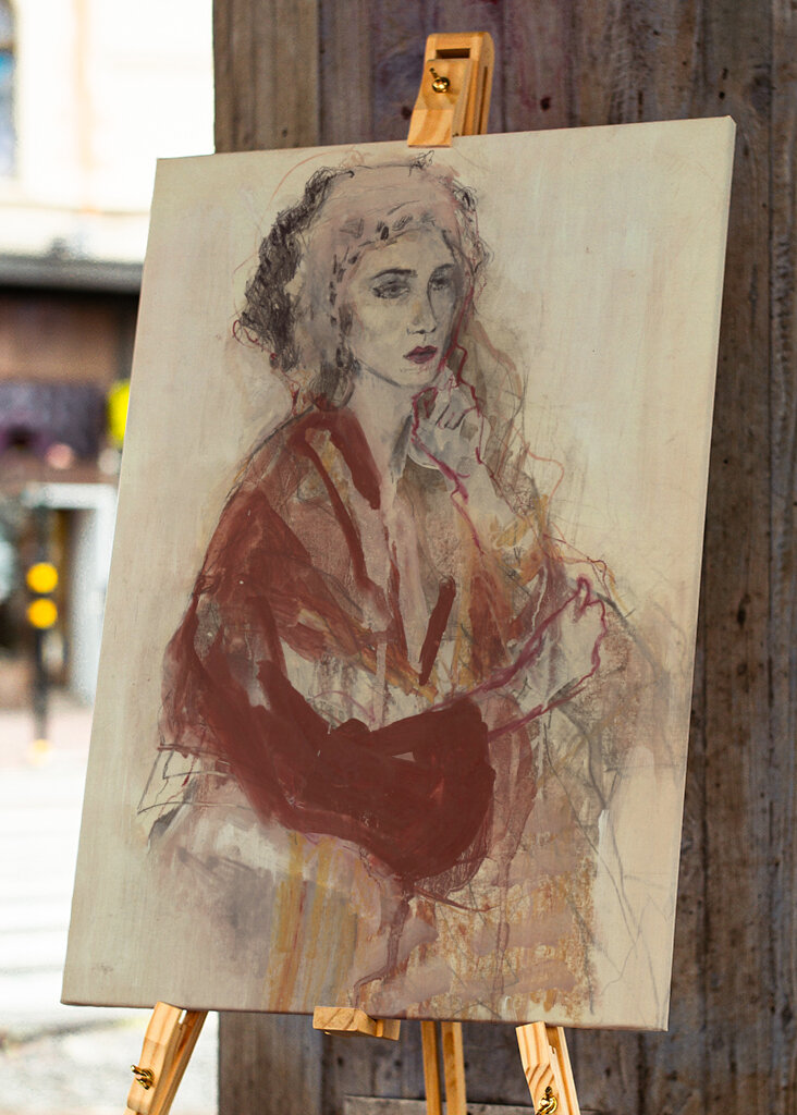 Contemplative Woman In Warm Red Tones