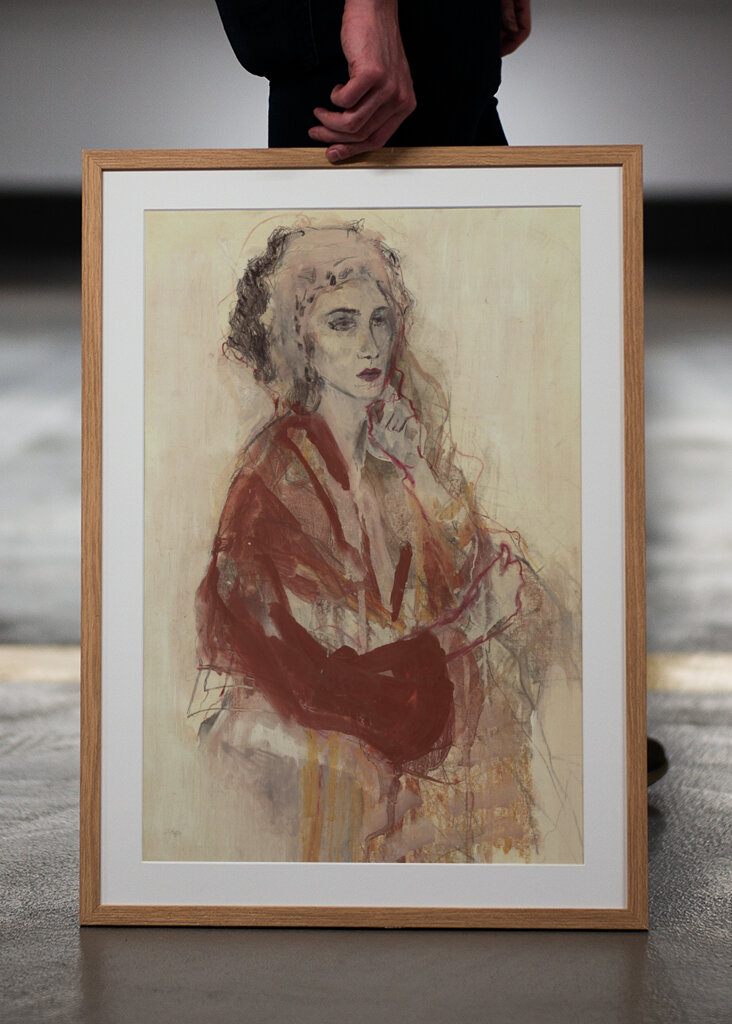 Contemplative Woman In Warm Red Tones