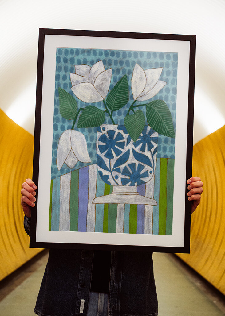 White Flowers In A Patterned Vase