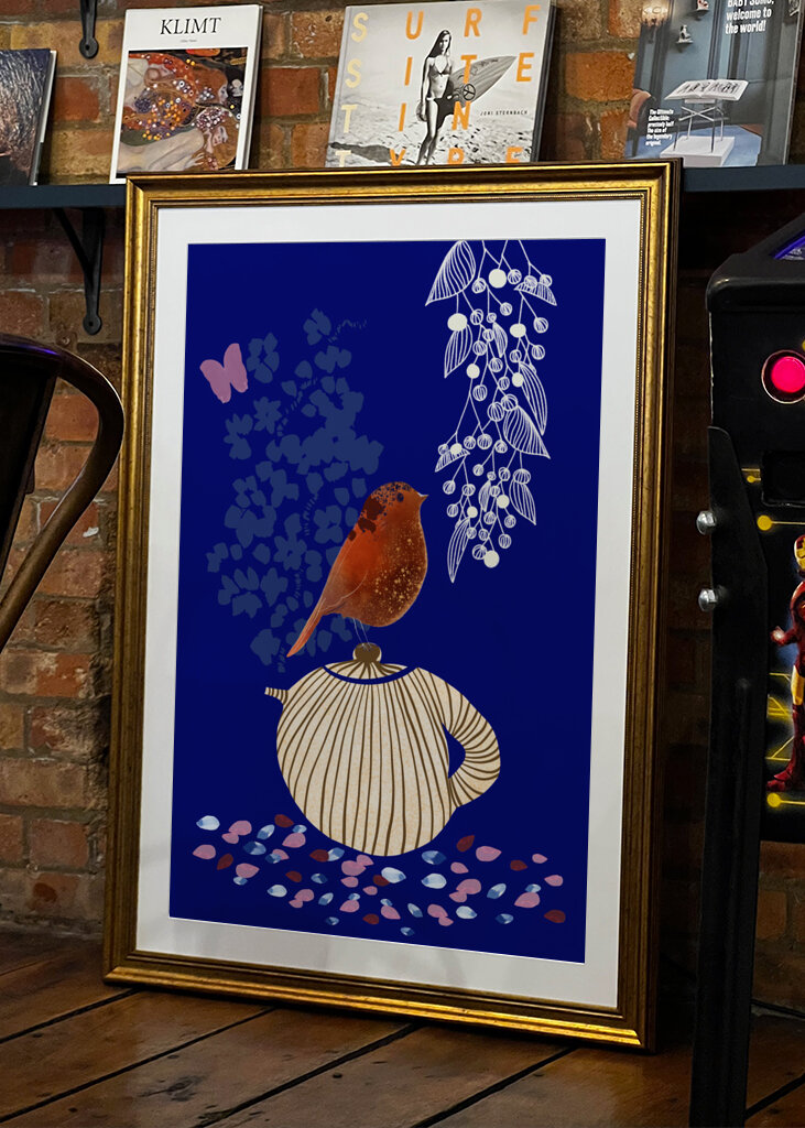 Red Bird Perched on a Striped Teapot
