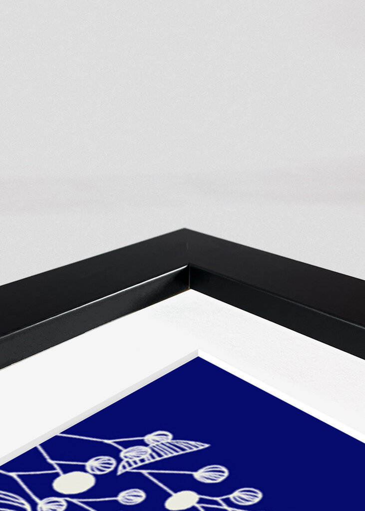 Red Bird Perched on a Striped Teapot