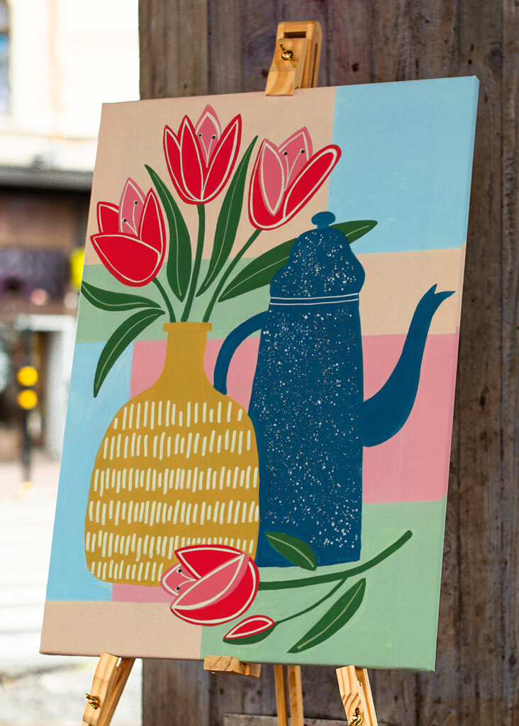 Vibrant Red Tulips In A Decorative Vase