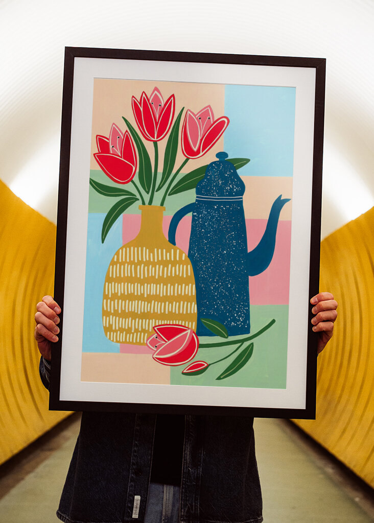 Vibrant Red Tulips In A Decorative Vase