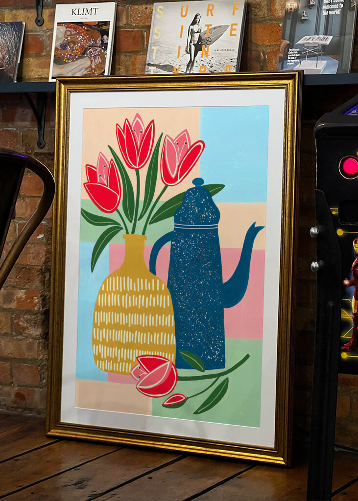 Vibrant Red Tulips In A Decorative Vase