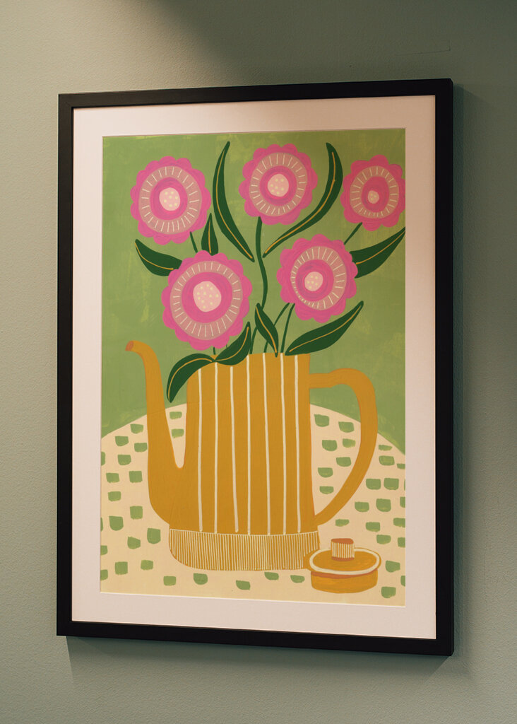 Pink Flowers In A Striped Yellow Teapot
