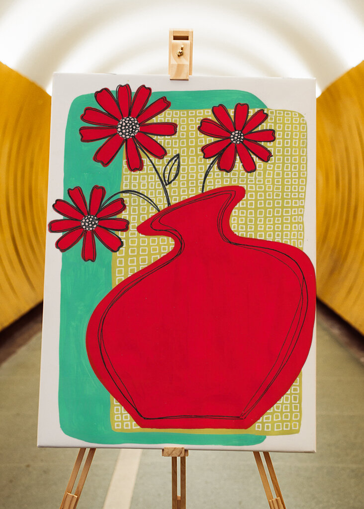 Vibrant Red Vase Blossoms