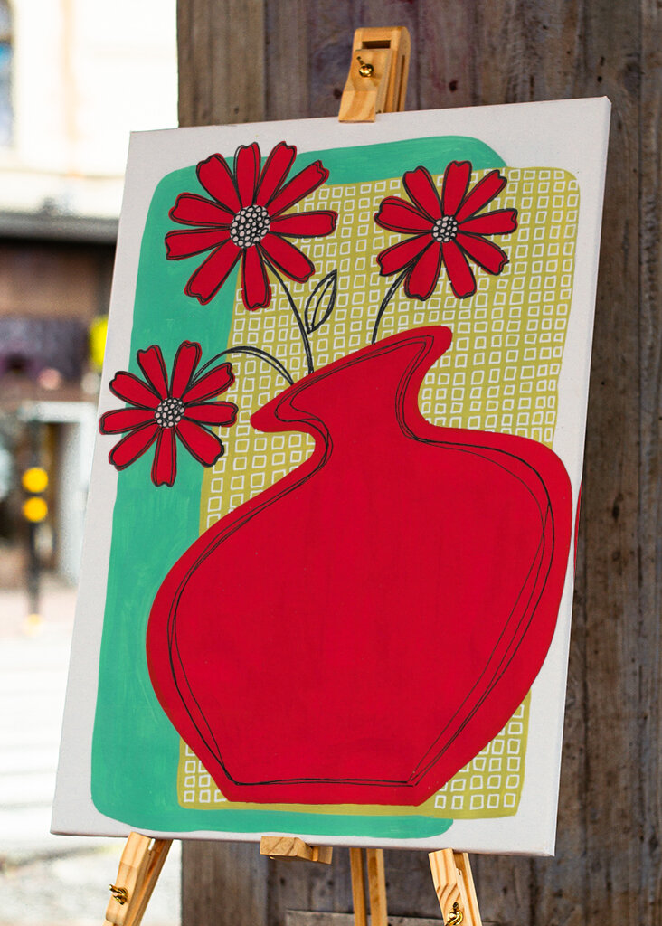 Vibrant Red Vase Blossoms