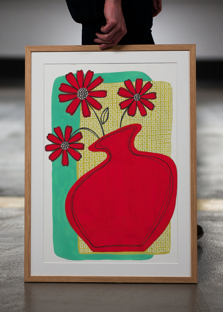 Vibrant Red Vase Blossoms