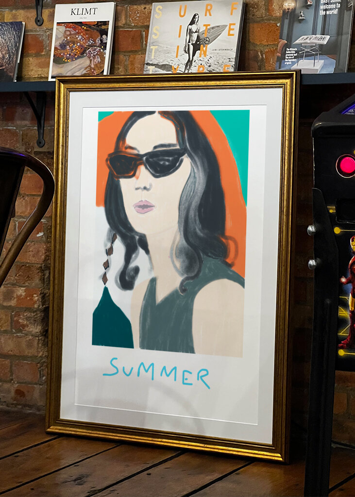 Woman in Sunglasses Exuding Summer Vibes