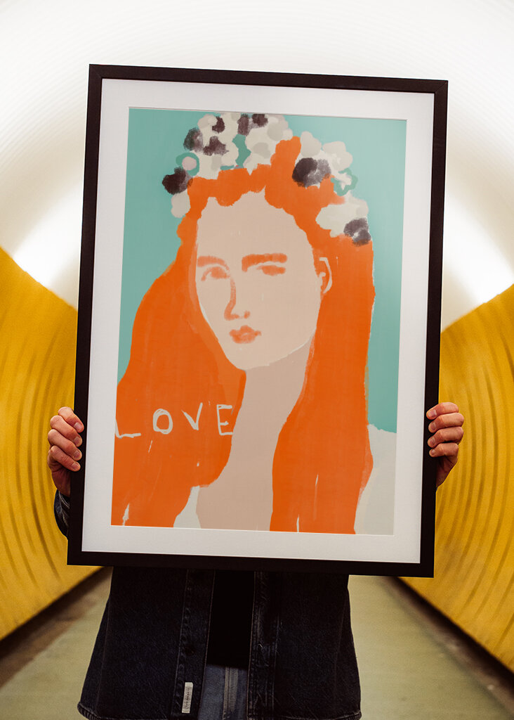 Woman with Orange Hair Adorned with Flowers