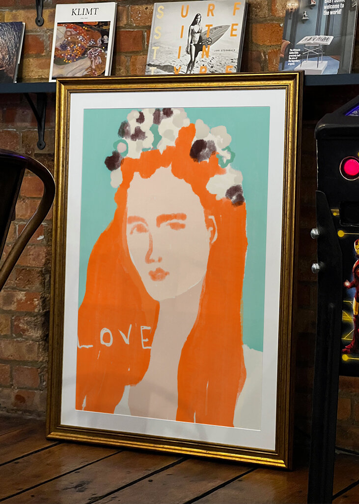 Woman with Orange Hair Adorned with Flowers