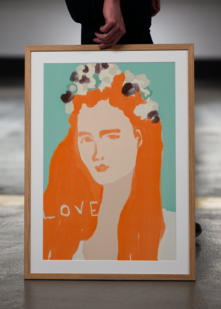 Woman with Orange Hair Adorned with Flowers