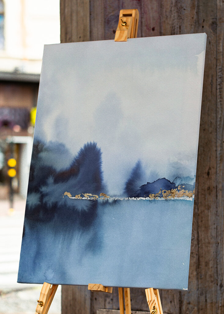 A Serene Misty Landscape in Shades of Blue