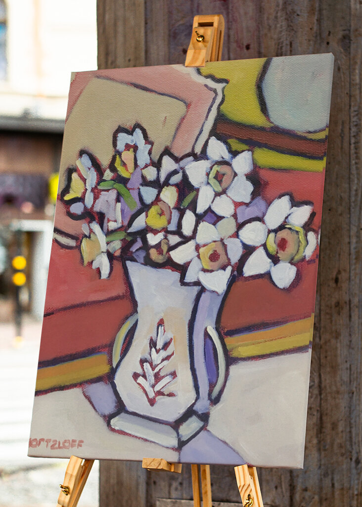 A Vase Of White And Yellow Flowers