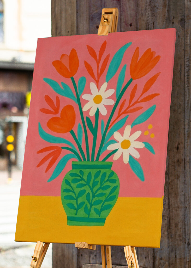 Colorful Flowers in a Decorative Green Vase