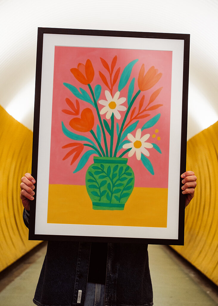 Colorful Flowers in a Decorative Green Vase