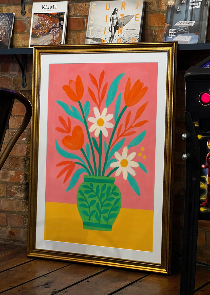 Colorful Flowers in a Decorative Green Vase