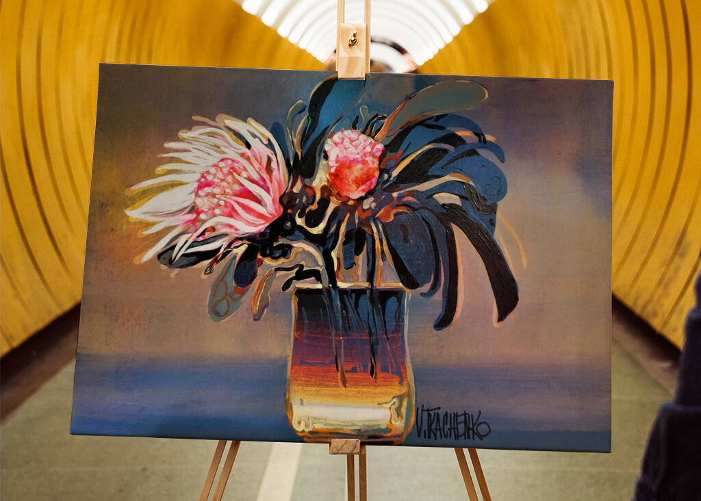 Vibrant Protea Flowers in a Glass Vase