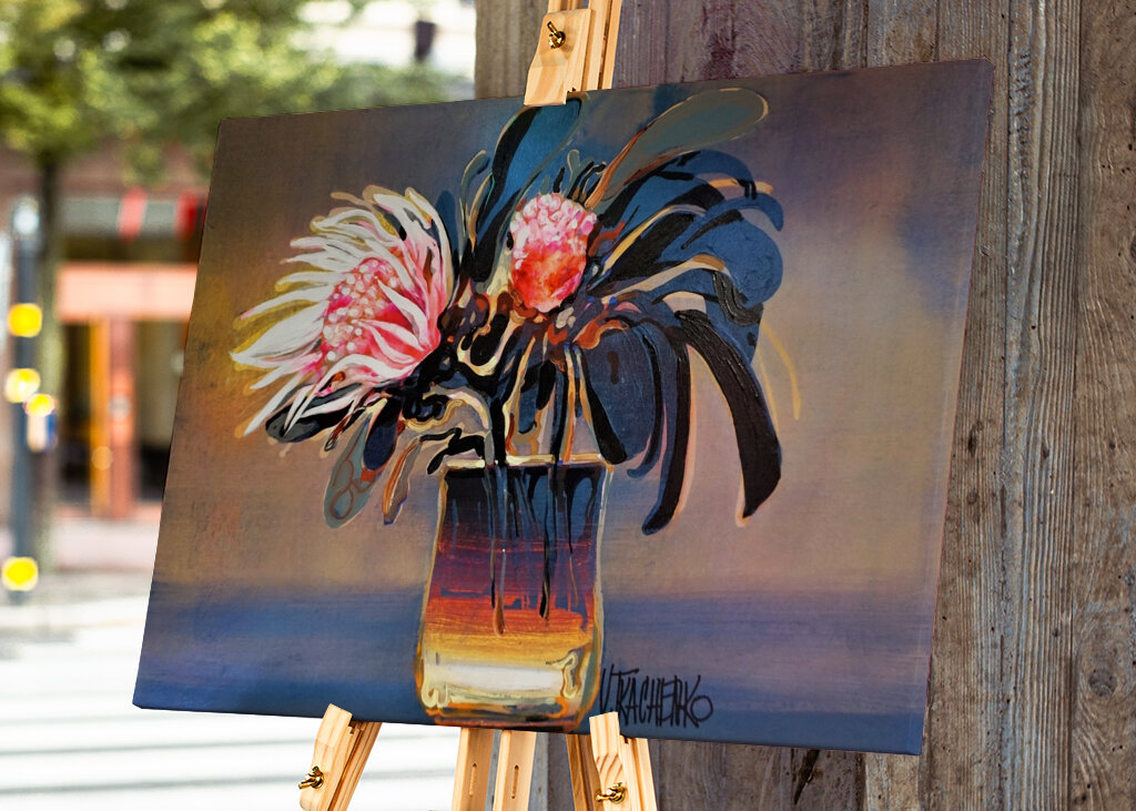 Vibrant Protea Flowers in a Glass Vase