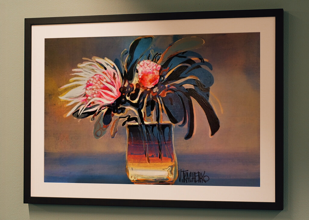 Vibrant Protea Flowers in a Glass Vase