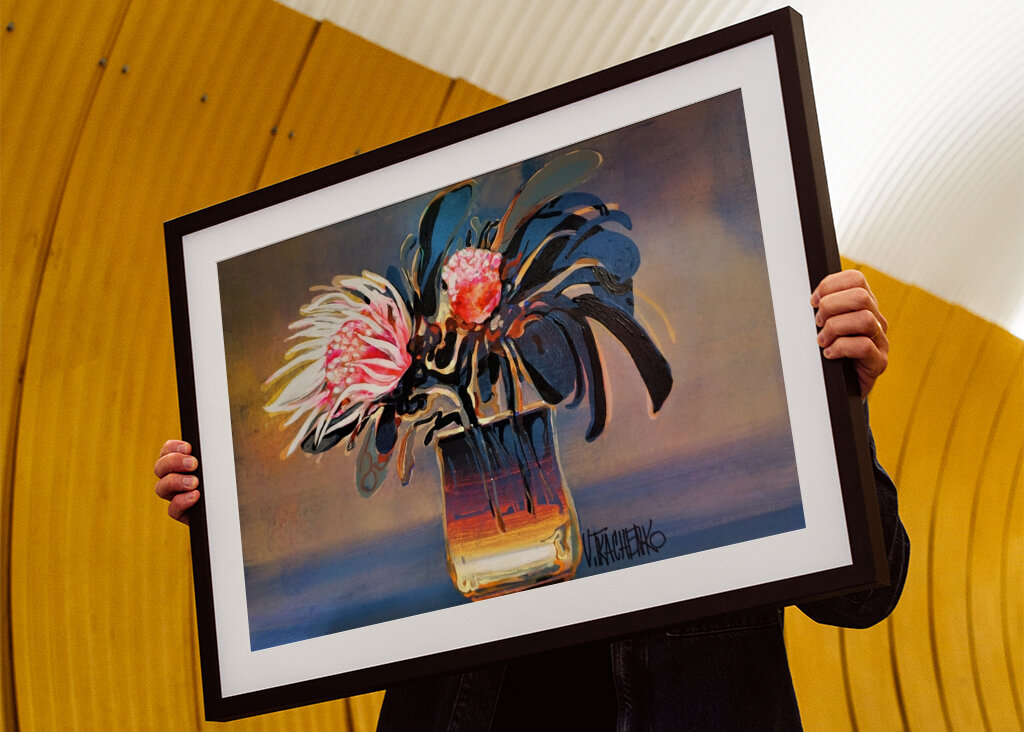 Vibrant Protea Flowers in a Glass Vase