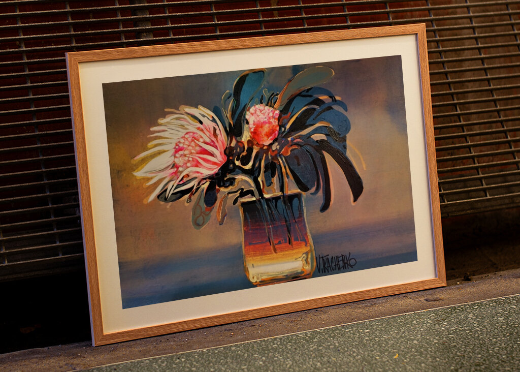 Vibrant Protea Flowers in a Glass Vase
